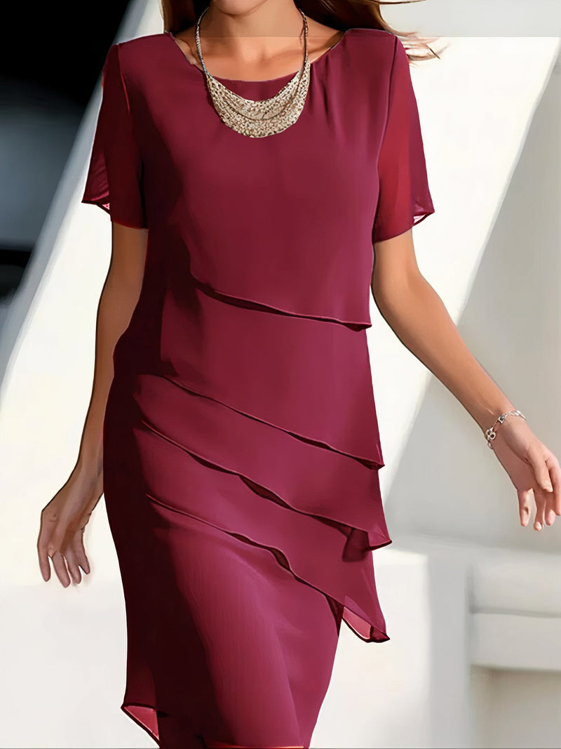 Elegante lange jurk met sierlijke ruches