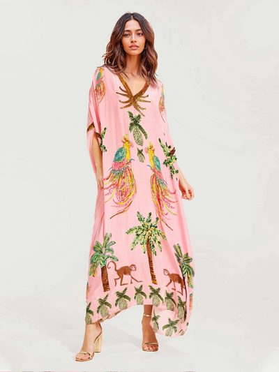 Lange maxi jurk met papegaaienprint voor een opvallende zomerse stijl