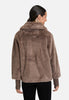 Stijlvolle korte jas in teddy stijl