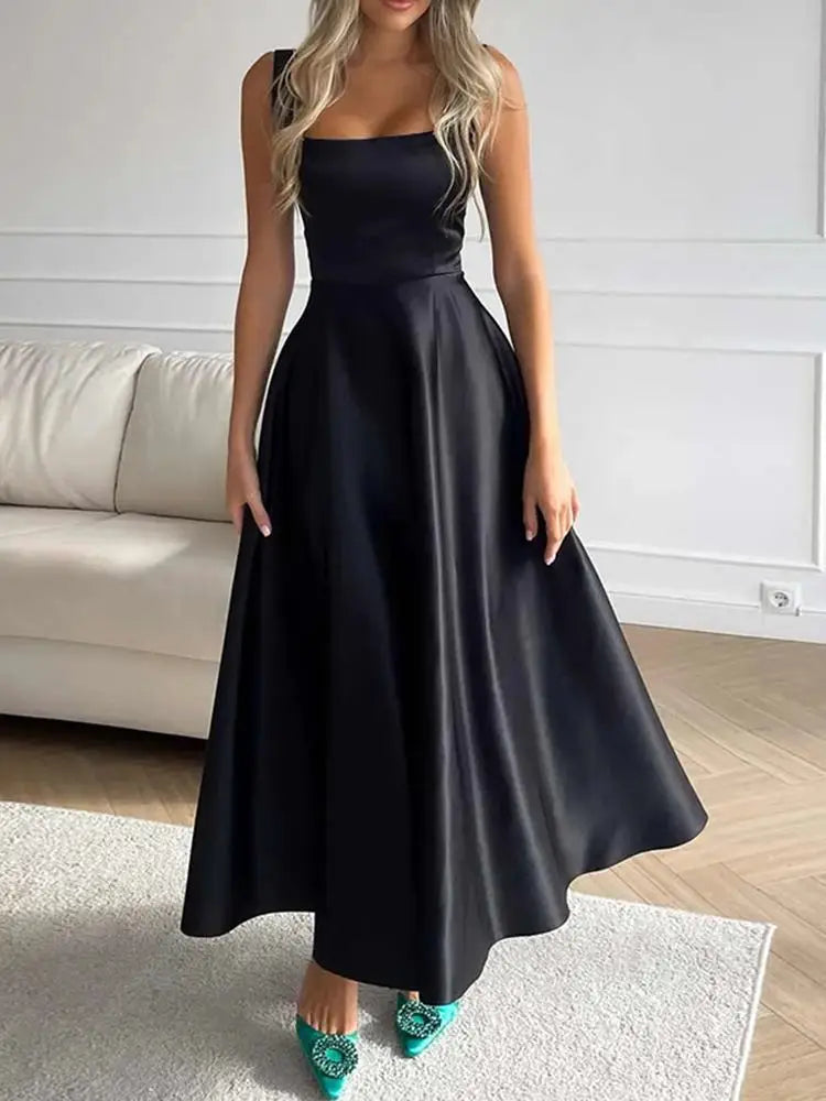Elegante maxi jurk in A-lijn model met smalle bandjes