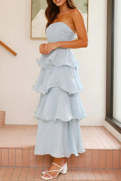 Rugloze strapless jurk met speelse ruches en gelaagde rok perfect voor feestelijke momenten