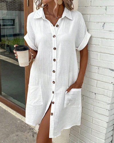 Comfortabele nonchalant jurk met korte mouwen en elegante knoopdetails
