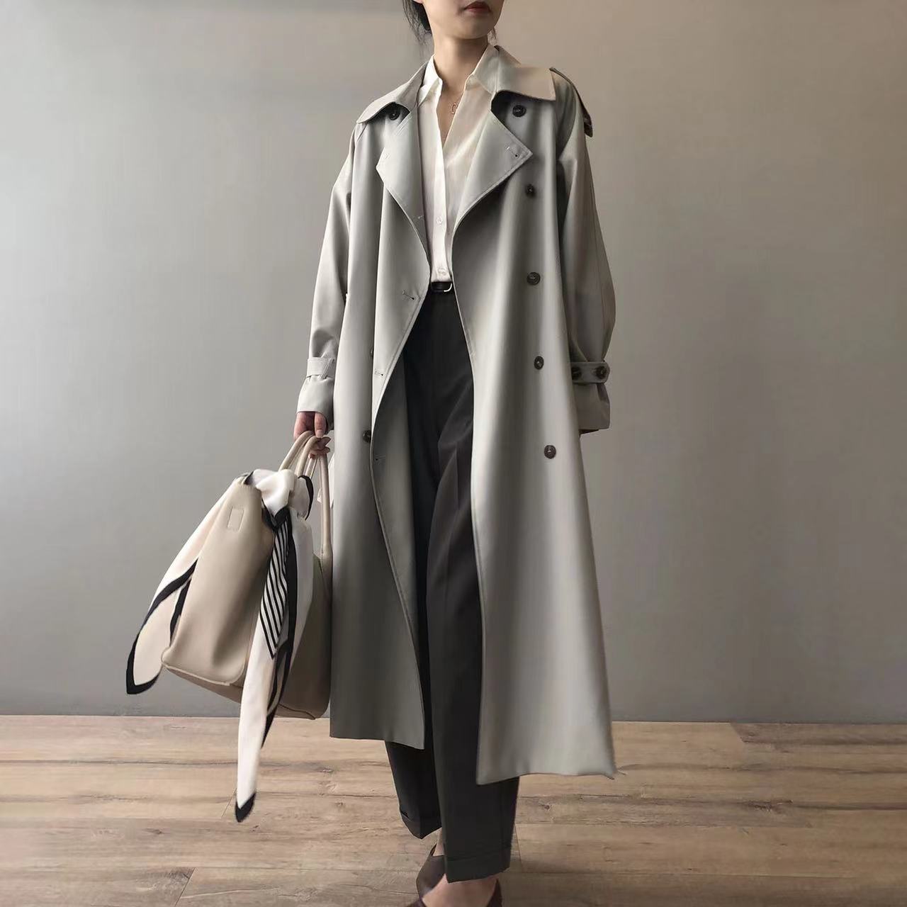 Lange dames trenchcoat met oversized pasvorm en dubbele knoopsluiting