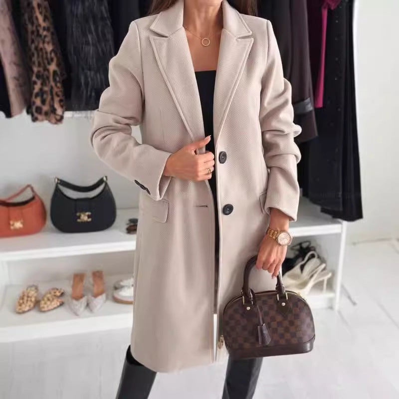Lange elegante damesjas met knoopsluiting