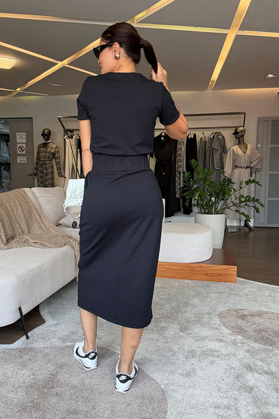 Elegante set met top met korte mouwen en midi rok voor een stijlvolle look
