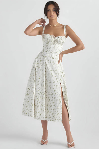Zomerse midi jurk met bandjes en sierlijke bloemenprint