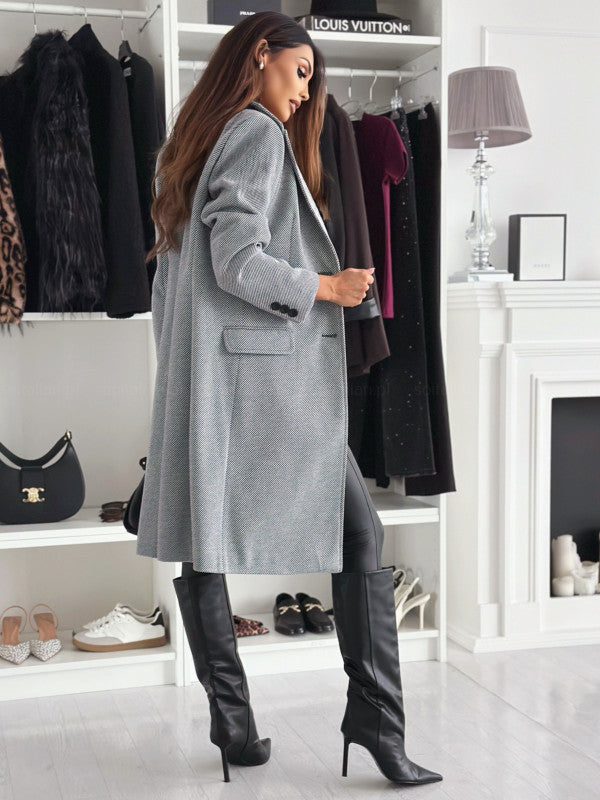 Lange elegante damesjas met knoopsluiting
