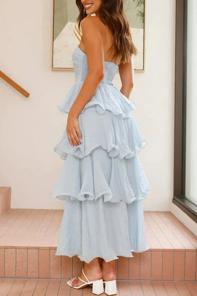 Rugloze strapless jurk met speelse ruches en gelaagde rok perfect voor feestelijke momenten