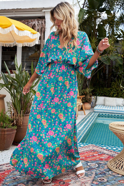 Claudia - Groene bohemian maxi jurk met diepe V-hals en bloemenprint