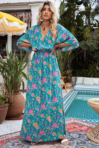 Claudia - Groene bohemian maxi jurk met diepe V-hals en bloemenprint