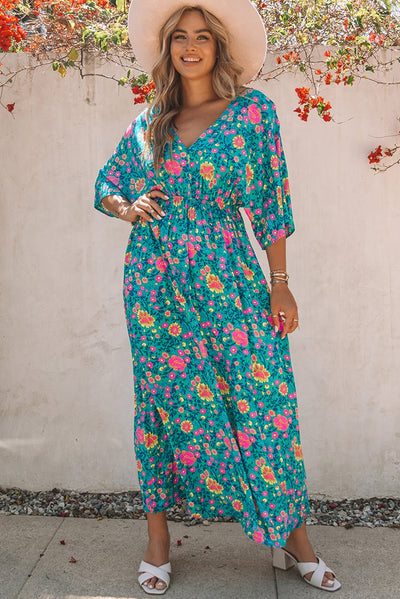 Claudia - Groene bohemian maxi jurk met diepe V-hals en bloemenprint