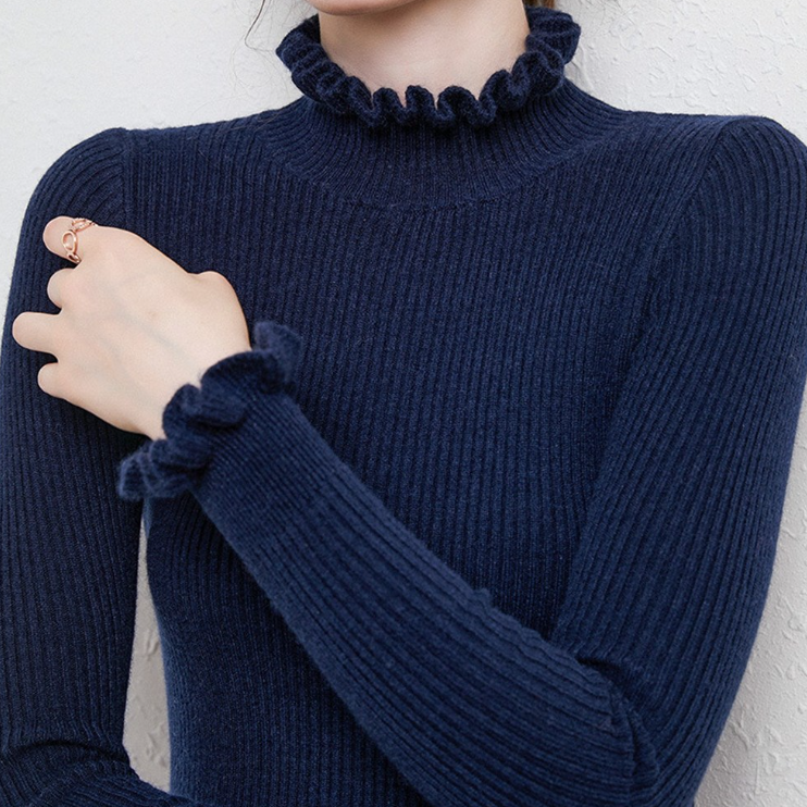 Stijlvolle dames coltrui met elegante kanten details aan kraag en mouwen