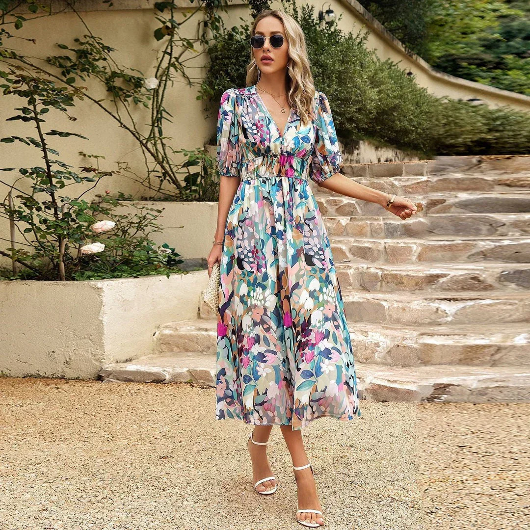 Bohemian maxi jurk met bloemenprint en korte mouwtjes