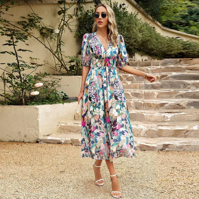 Bohemian maxi jurk met bloemenprint en korte mouwtjes