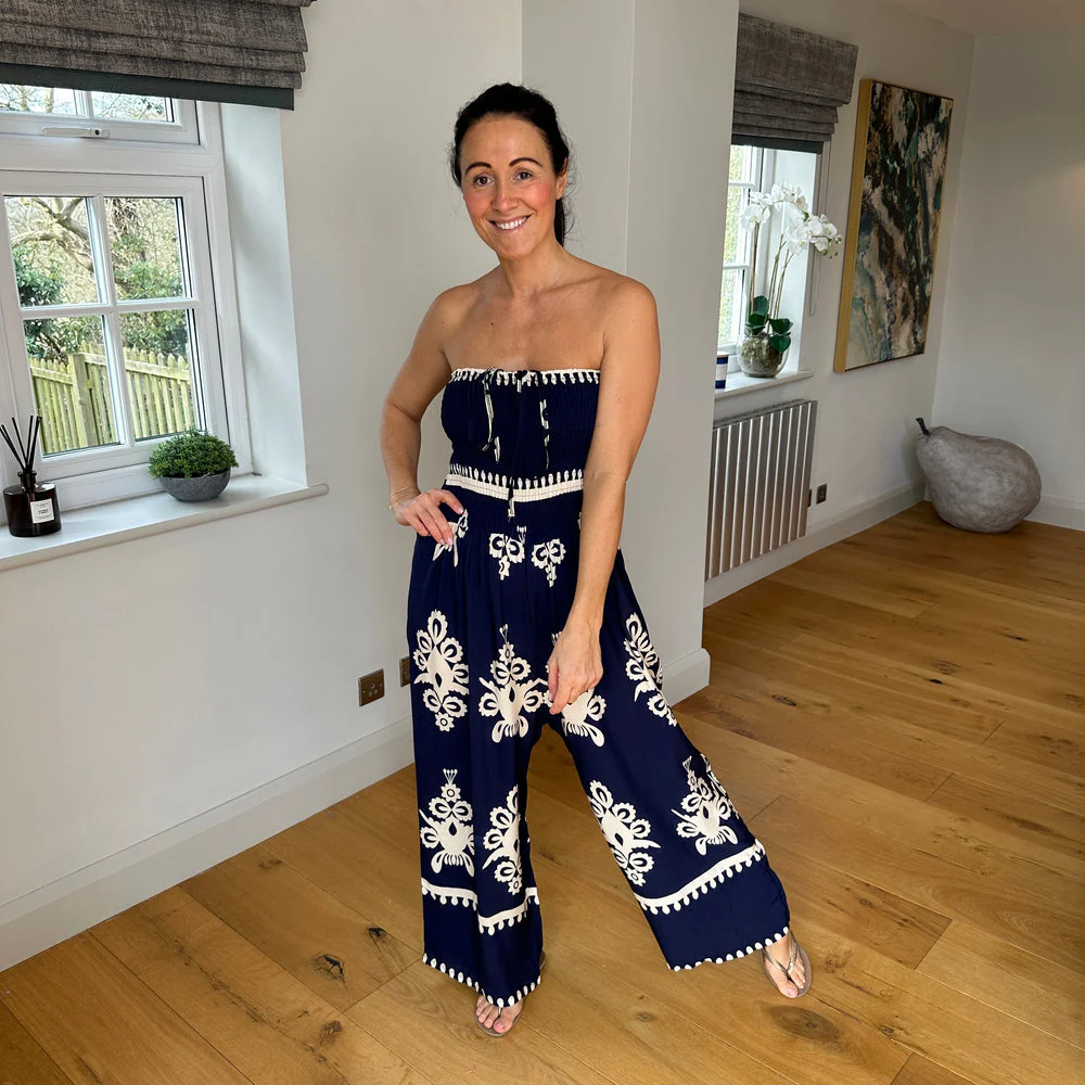 Lange wijde dames jumpsuit met halterstijl bovenkant