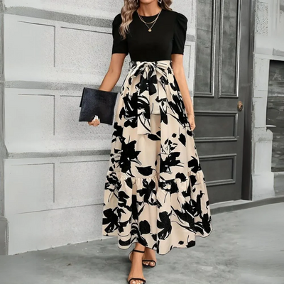 Lange zomerjurk met plantenmotief en korte mouwen voor een stijlvolle look