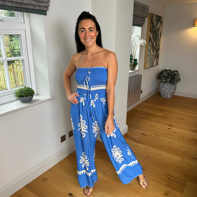 Lange wijde dames jumpsuit met halterstijl bovenkant