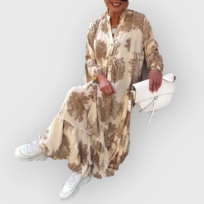 Elegante lange jurk met wijde pasvorm lange mouwen en boho uitstraling