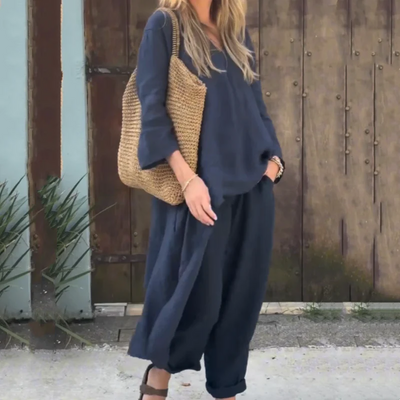 Tweedelige dames set met lange top en broek met asymmetrische zoom