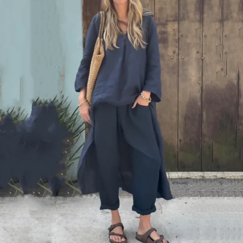 Tweedelige dames set met lange top en broek met asymmetrische zoom