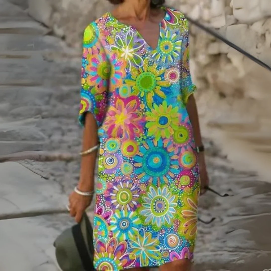 Boho midi zomerjurk met bloemenprint en driekwart mouwen voor een ontspannen stijl