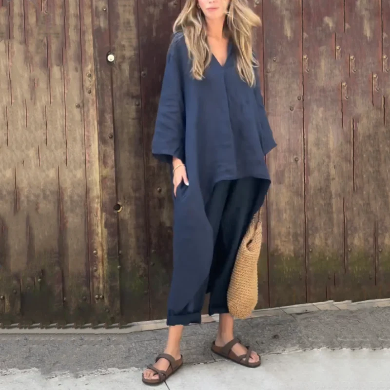 Tweedelige dames set met lange top en broek met asymmetrische zoom