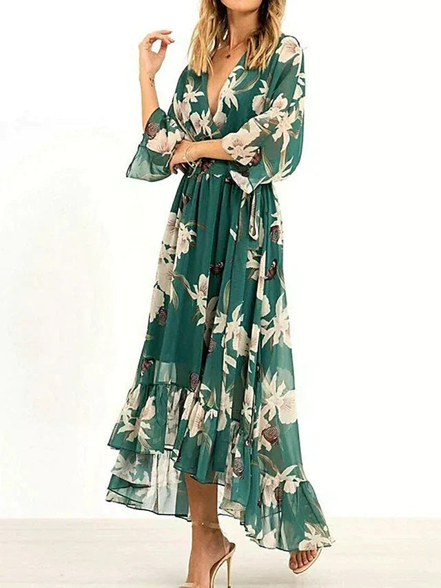 Elegante zomerjurk met lange rok, stijlvolle details en diepe halslijn voor een modieuze uitstraling