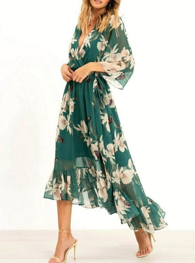 Elegante zomerjurk met lange rok, stijlvolle details en diepe halslijn voor een modieuze uitstraling