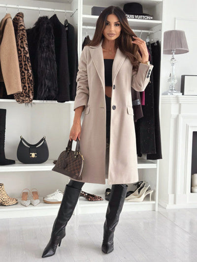 Lange elegante damesjas met knoopsluiting