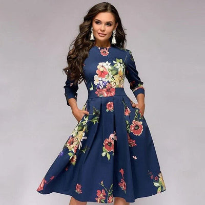 Stijlvolle midi-jurk met wijde rok en bloemenpatroon voor een elegante uitstraling