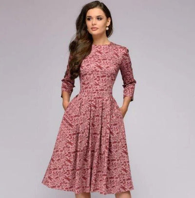 Stijlvolle midi-jurk met wijde rok en bloemenpatroon voor een elegante uitstraling
