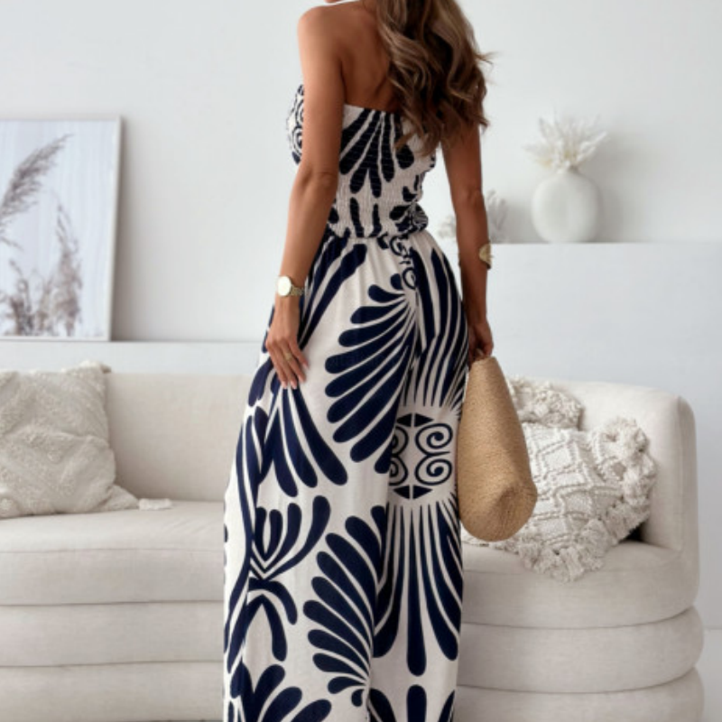 Elegante strapless jumpsuit met wijde pijpen en subtiel patroon