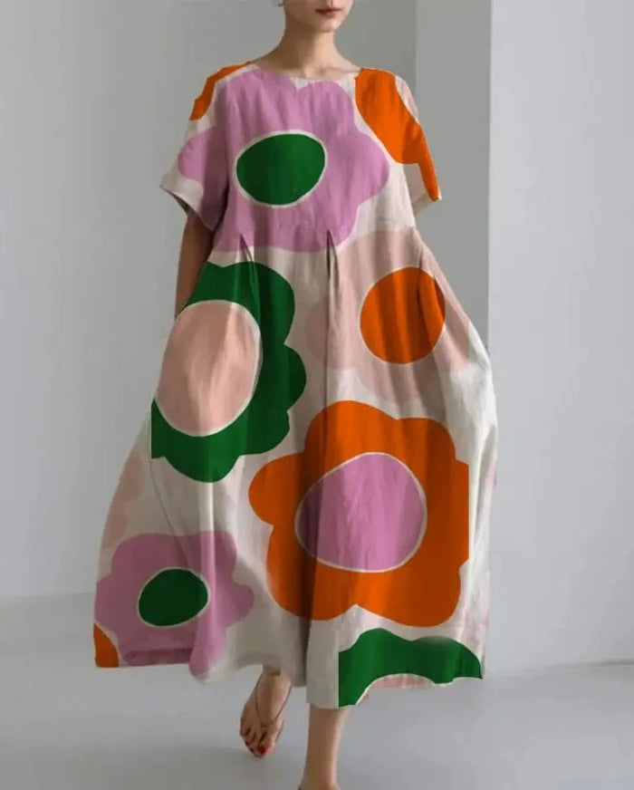 Lange losse jurk met opvallende bloemenprint