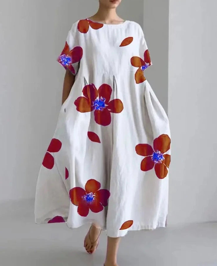 Lange losse jurk met opvallende bloemenprint