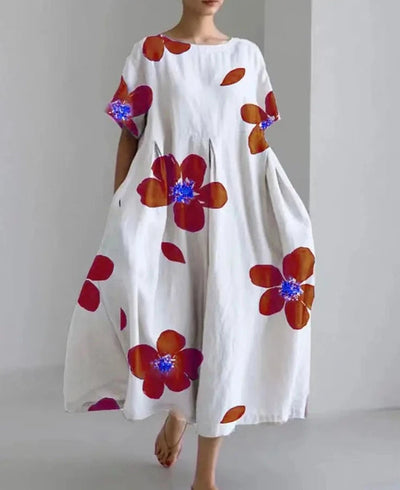 Lange losse jurk met opvallende bloemenprint