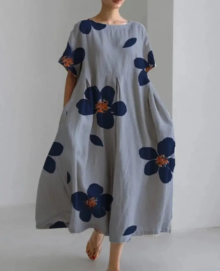 Lange losse jurk met opvallende bloemenprint