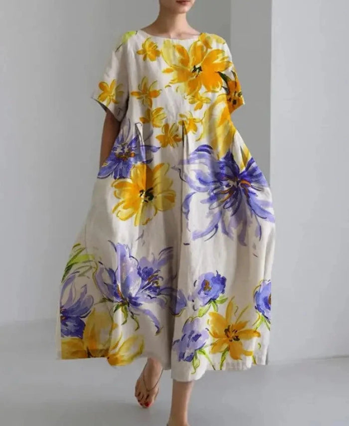 Lange losse jurk met opvallende bloemenprint